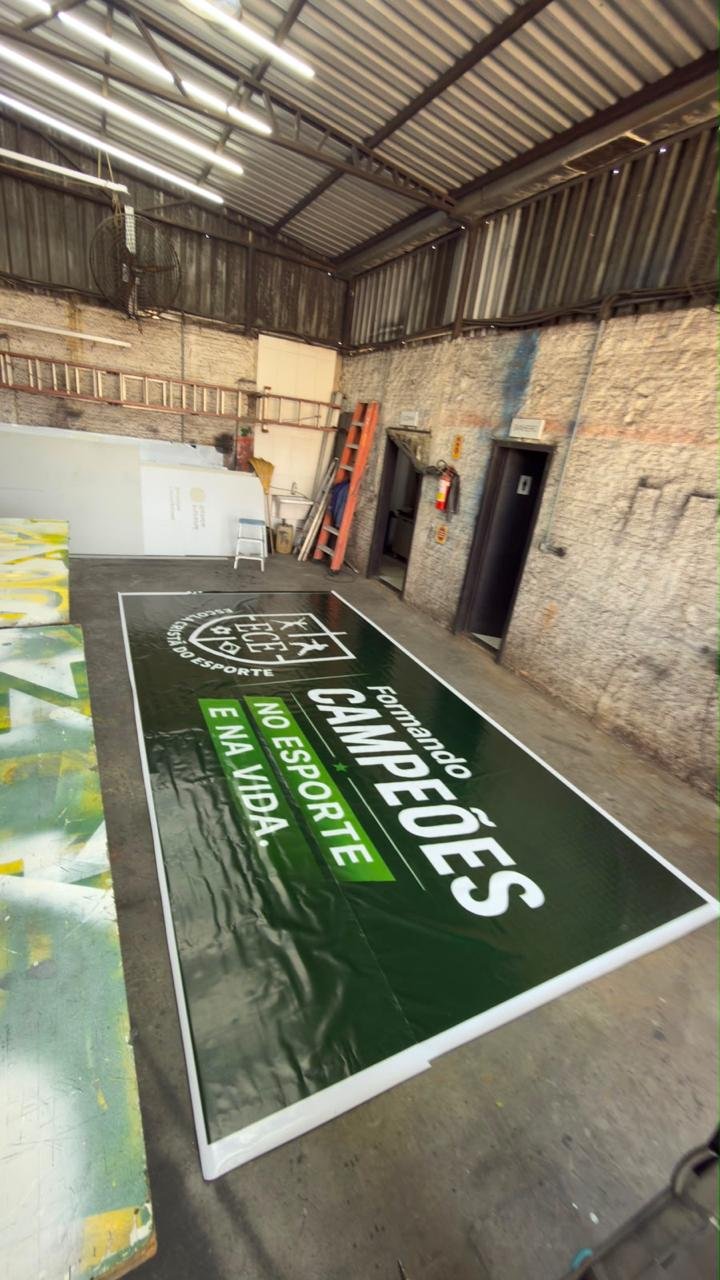 Produção de placa em lona para campanha esportiva